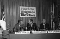 Уолт и Рой Дисней с губернатором Флориды У. Хейдоном Бернсом, объявляющим о планах создания в штате тематического парка Дисней (открылся в 1971), 1965